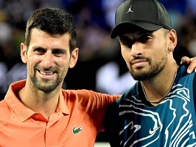 Serbia's Novak Djokovic (L) and Australia's Nick Kyrgios pose for pictures during their Arena Showdown charity match ahead of the Australian Open tennis tournament in Melbourne on January 13, 2023. (Photo by WILLIAM WEST / AFP) / --IMAGE RESTRICTED TO EDITORIAL USE - STRICTLY NO COMMERCIAL USE--