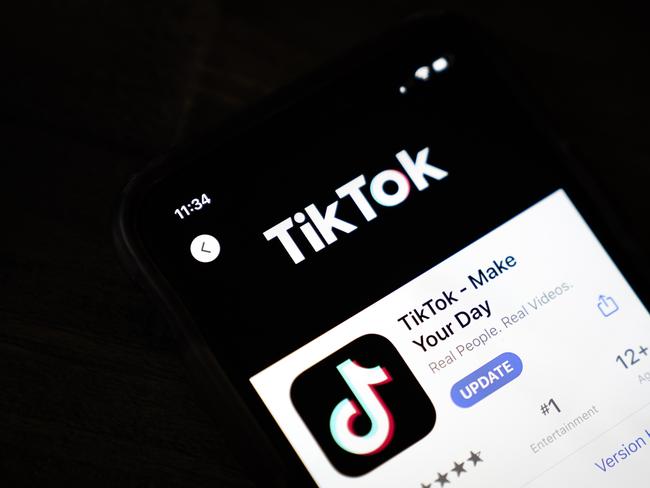 WASHINGTON, DC - AUGUST 07: In this photo illustration, the download page for the Tiki Tok app is displayed on an Apple iPhone on August 7, 2020 in Washington, DC. On Thursday evening, President Donald Trump signed an executive order that bans any transactions between the parent company of TikTok, ByteDance, and U.S. citizens due to national security reasons. The president signed a separate executive order banning transactions with China-based tech company Tencent, which owns the app WeChat. Both orders are set to take effect in 45 days. (Photo Illustration by Drew Angerer/Getty Images) == FOR NEWSPAPERS, INTERNET, TELCOS & TELEVISION USE ONLY ==