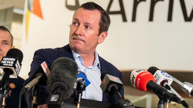 West Australian Premier Mark McGowan speaks to the media at Perth airport about opening the borders with other states. Picture: NCA NewsWire / Tony McDonough