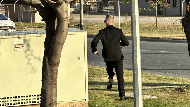 Chief Petty Officer Jerome Donald left in a rush after his hearing on Tuesday. Picture: Sam Turner