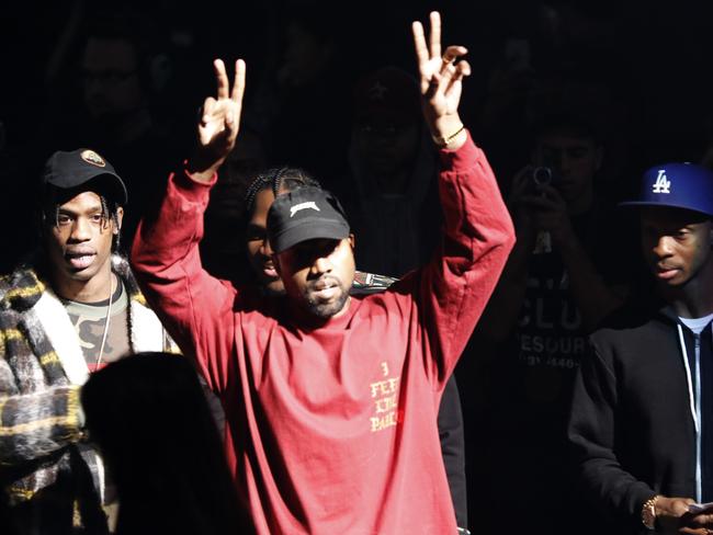 Kanye West gestures to the audience at the unveiling of the Yeezy collection and The Life of Pablo album release. Picture: AP
