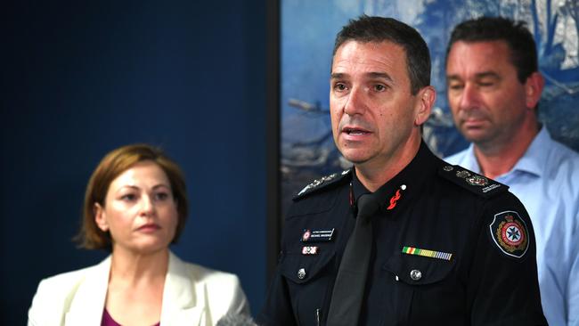 Acting Fire Commissioner Michael Wassing with Acting Premier Jackie Trad. Picture: AAP image/John Gass