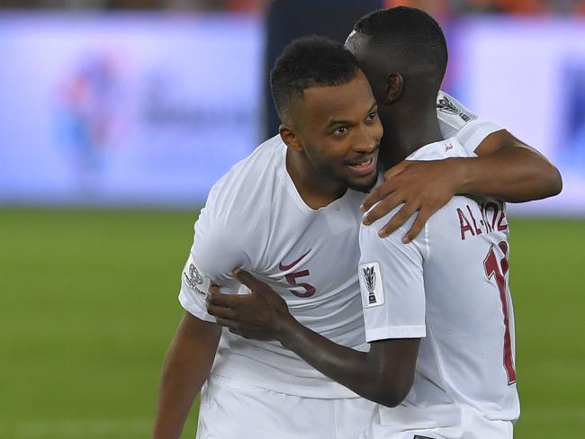 ABU DHABI, UNITED ARAB EMIRATES - FEBRUARY 01: Almoez Ali of Qatar celebrates the victory with his teammate after the AFC Asian Cup final match between Japan and Qatar at Zayed Sports City Stadium on February 01, 2019 in Abu Dhabi, United Arab Emirates. (Photo by Koki Nagahama/Getty Images)