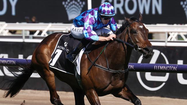 Pride of Jenni ridden by Declan Bates in full flight winning the Champions Mile at Flemington. Picture: Michael Klein