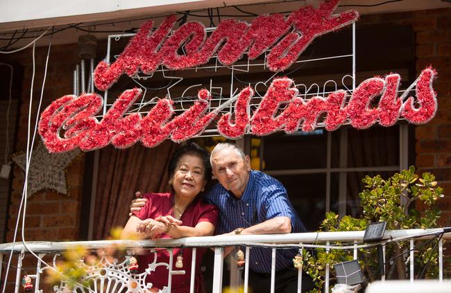 Gloria and Erminio Buosi put up their Christmas lights for the last time before they move into a unit. Pictures: Julian Andrews