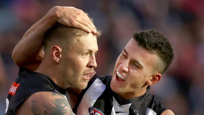 MELBOURNE. 07/05/2023. AFl.  Round 8. Collingwood vs Sydney at the MCG.  Jordan De Goey of the Magpies is congratulated by Nick Daicos after a 2nd qtr goal . Pic: Michael Klein