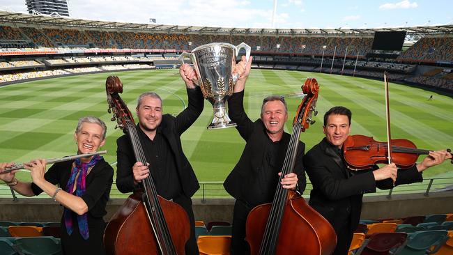 Members of the Queensland Symphony Orchestra, Paul O’Brien, Alison Mitchell, Nicholas Tomkin, Dusan Walkowicz who will be playing at the AFL Grand Final. Picture: Peter Wallis