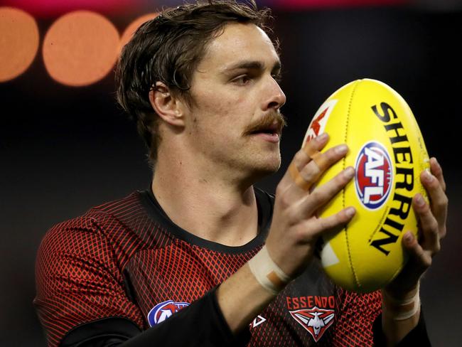 Joe Daniher of the Bombers warms up ahead of the Round 9 AFL match between the Essendon Bombers and the Fremantle Dockers at Marvel Stadium in Melbourne, Saturday, May 18, 2019. (AAP Image/Mark Dadswell) NO ARCHIVING, EDITORIAL USE ONLY