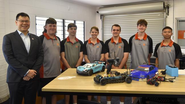 TE H2 Australian managing director Kam Ho with Palmerston Christian College Hydrogen Grand Prix team Kayden Bourchier, Benny Sonsie-Daams, Tannum Jones-Materne, Michael Jessup, Ezekiel Kernick, and Johann de Guzman. The team will compete at the Hydrogen World Final in California in September.