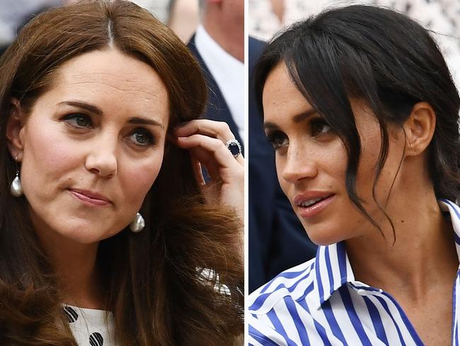 LONDON, ENGLAND - JULY 14:  Catherine, Duchess of Cambridge and Meghan, Duchess of Sussex attend day twelve of the Wimbledon Lawn Tennis Championships at All England Lawn Tennis and Croquet Club on July 14, 2018 in London, England.  (Photo by Clive Mason/Getty Images)