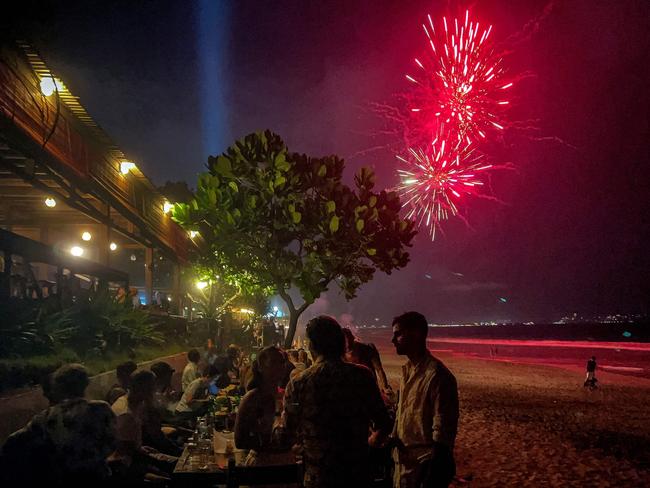 Fireworks illuminate the night sky at the beach on December 31, 2023 in the Kerobokan district on the resort island of Bali, Indonesia. Picture: AFP