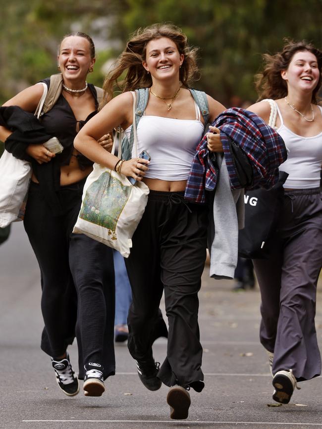 Revellers make a dash for the best spots to watch the Sydney fireworks. Picture: Sam Ruttyn