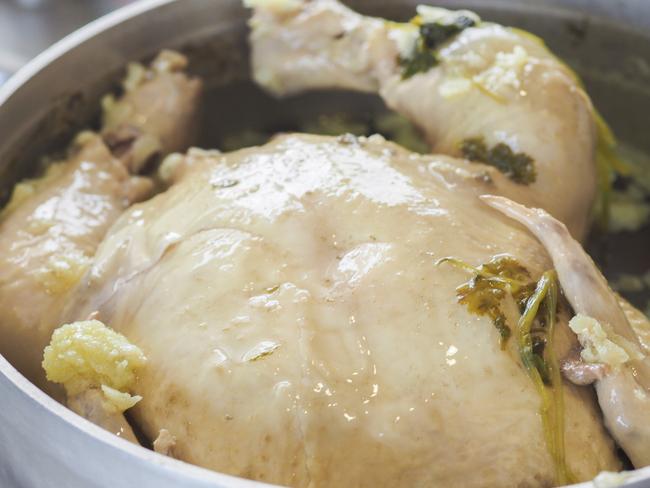 Infuse the liquid with aromatics and spices to give a layer of depth to your poached chicken, and the remaining broth.