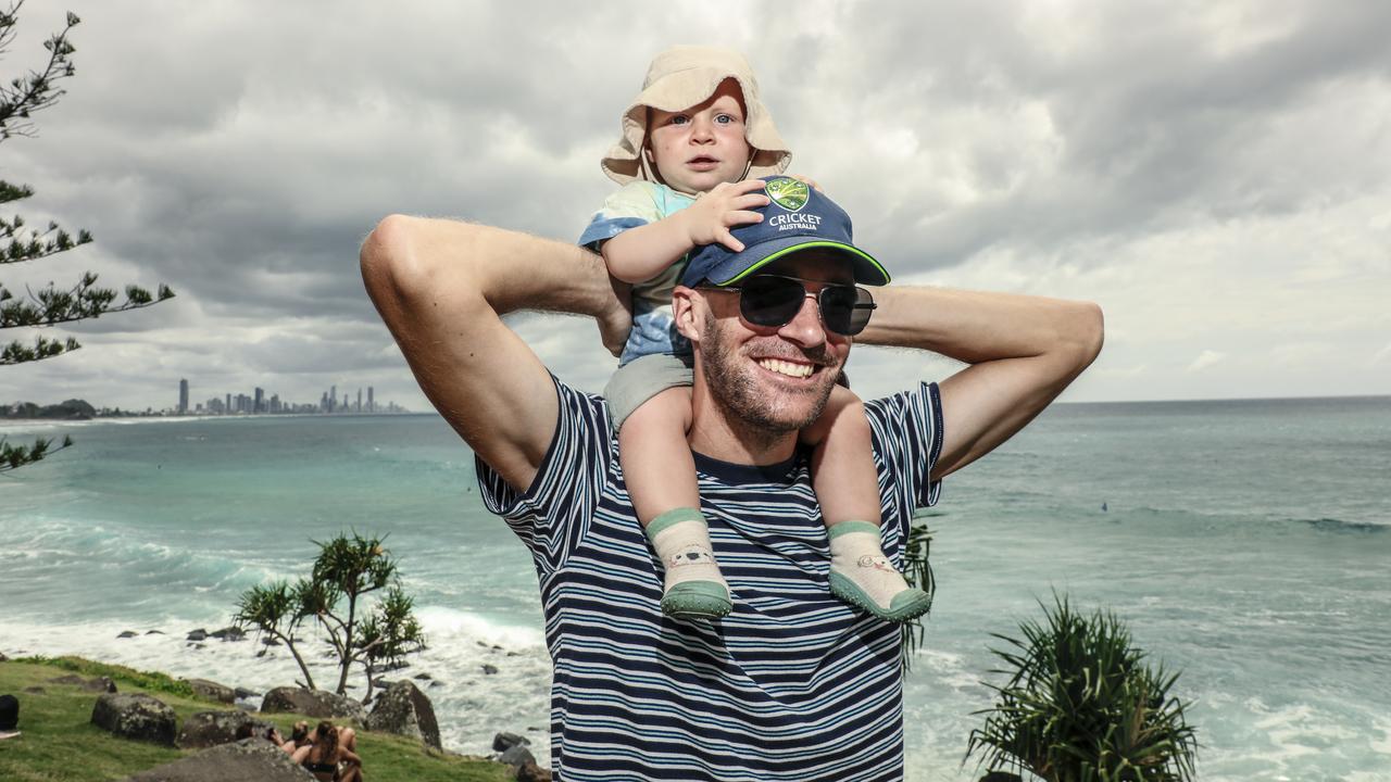 Emil Wall and son Hugo 1 among the crowd at the 2025 Gold Coast Open surf comp at Burleigh Heads. Picture: Glenn Campbell