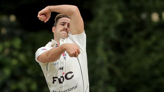 Devlin Malone of Sydney Uni bowls at the University of Sydney Oval on October 1, 2022. (Photo by Jeremy Ng / Newscorp)