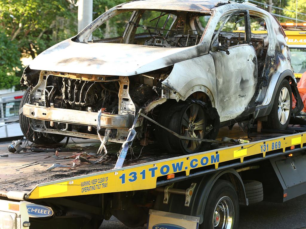 The burnt out car is removed that Rowan Baxter killed his three children and himself after he allegedly deliberately set the car alight. His wife, Hannah Baxter died of her injuries. Picture: Lyndon Mechielsen/The Australian