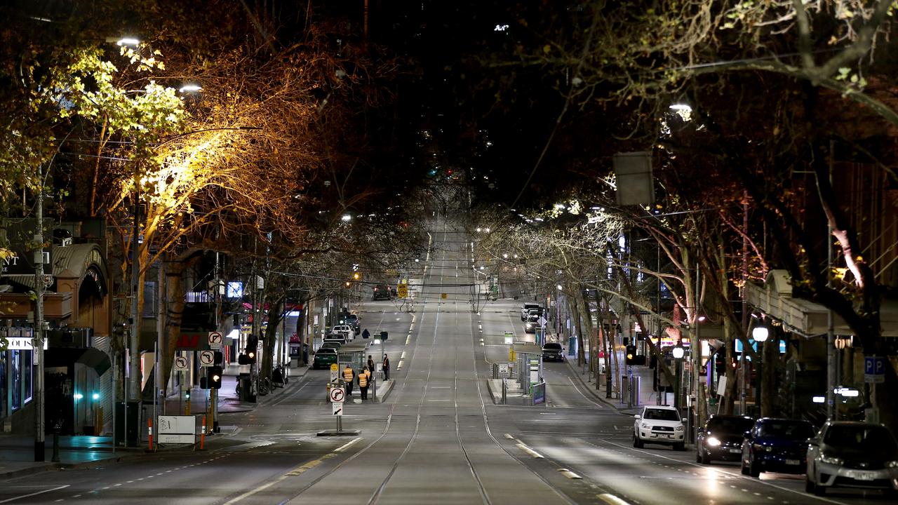 Collins Street was completely empty after 8pm. Picture: Darrian Traynor/Getty Images