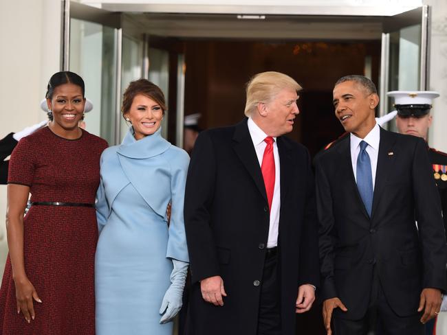 President Barack Obama and First Lady Michelle Obama welcome incoming President Donald Trump and his wife Melania to the White House in Washington, DC on January 20, 2017. Picture: AFP
