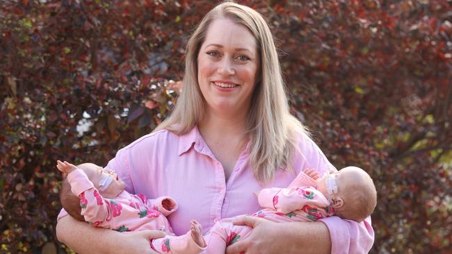 Gold Coast mum Jennifer Hockings with her premature twin girls, Audrey and Adeline.