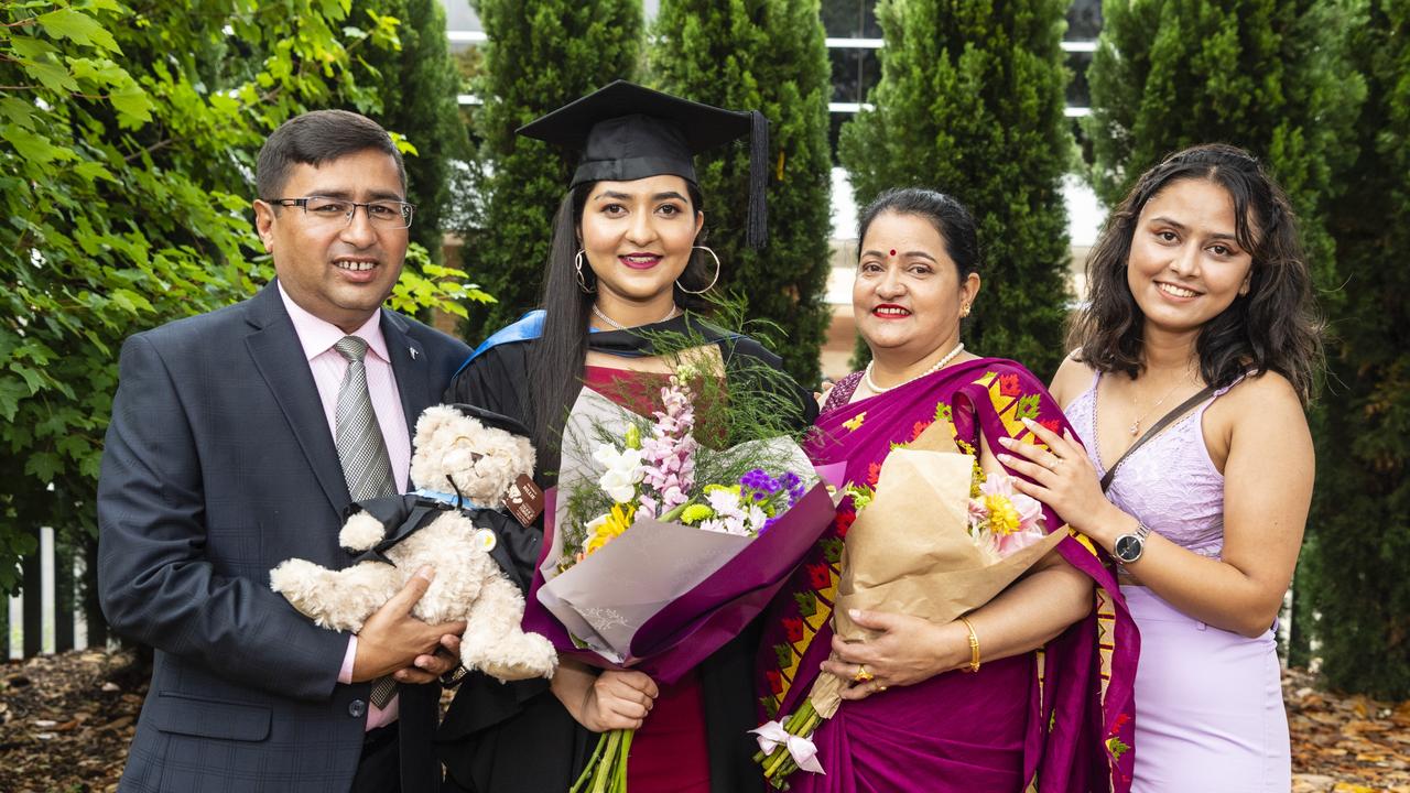 Bachelor of Nursing graduate Yupika Gautam with dad Lila Gautam, mum Kabita Gautam and sister Aastha Pandey at the UniSQ graduation ceremony at Empire Theatres, Tuesday, December 13, 2022. Picture: Kevin Farmer