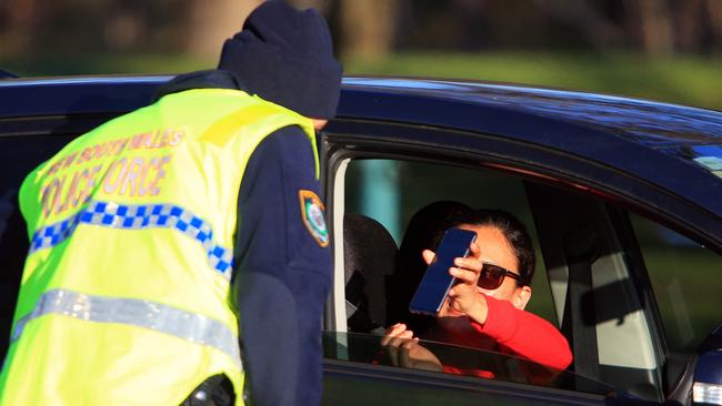 8/07/20 NSW police check resident's permits after NSW closed the border to those on the Victorian side. Picture: Aaron Francis/The Australian