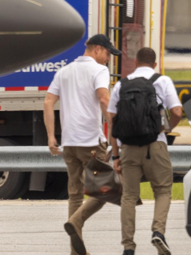 Prince Harry and Meghan Markle arriving in Atlanta on a private flight after a weekend in Grenada. Picture: Backgrid