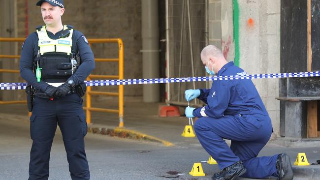 Evidence is marked out at the Flinders St carpark. Picture: AAP Image/David Crosling