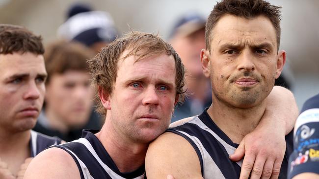 Brent Marshall and Sam Lloyd look on after the grand final. Picture: Hamish Blair