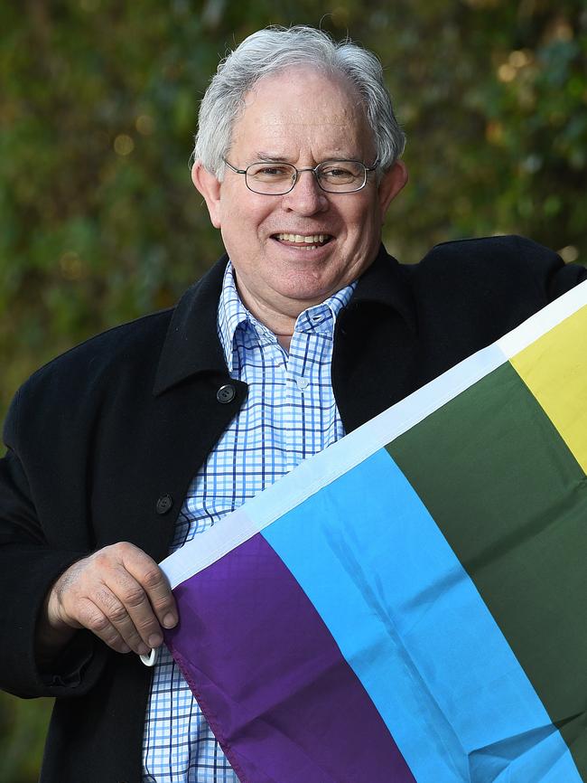 Mitcham Councillor Stephen Fisher with a rainbow flag after the council agreed to fly it during the Feast Festival. Picture Roger Wyman