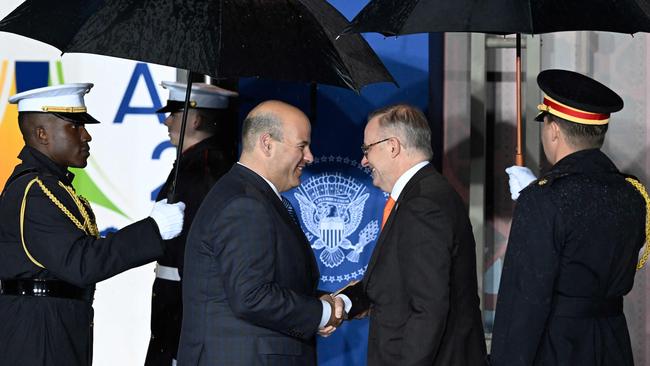 US Acting Chief of Protocol Ethan Rosenzweig greets Anthony Albanese as he arrives at an APEC reception at the Exploratorium in San Francisco.