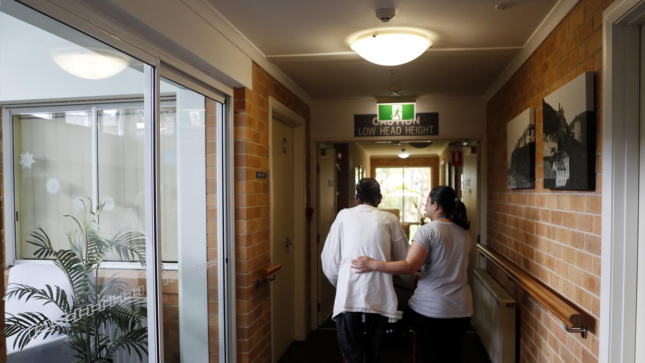 Resident and staff member at an Allambie Heights aged care facility as new coronavirus rules came in last week. Picture: Nikki Short