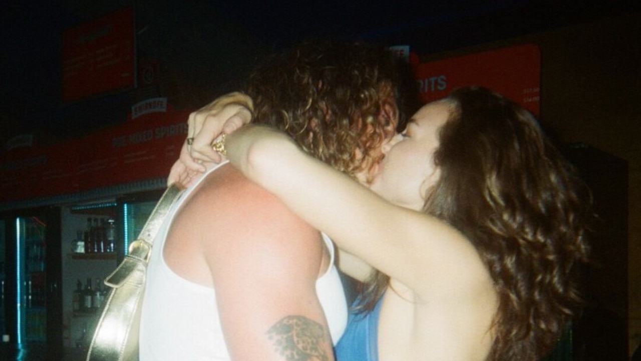 Abbie Chatfield kisses Adam Hyde. Picture: Supplied