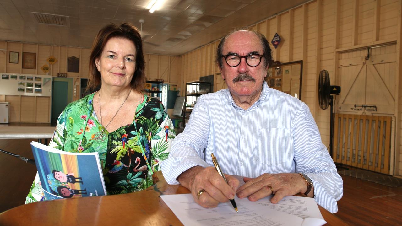 Holloways Beach flood victim Kathy Pitt and convener of the Barron Floodplain Action Group Ross Parisi at the Machans Beach Community Hall for the signing of a Barron River flooding memorandum of understanding. Picture: Peter Carruthers