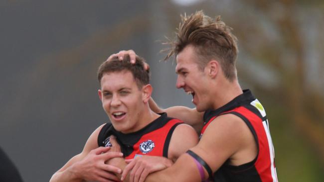 Football GFL: Bell Park v Newtown &amp; Chilwell . Newtown &amp; Chilwell 16 Charlie Harris kicks a goal and celebrates with 15 Lachlan Bond (right) Picture: Mark Wilson