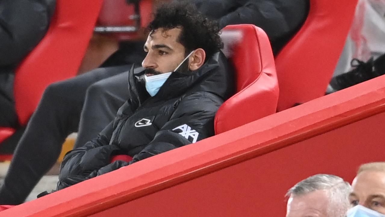 Mohamed Salah was not happy when he got benched. (Photo by Laurence Griffiths / POOL / AFP)