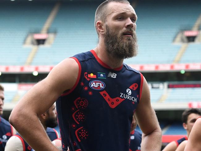 Max Gawn of the Demons reacts after the Round 10 AFL match between the Melbourne Demons and the GWS Giants at the MCG in Melbourne, Sunday, May 26, 2019. (AAP Image/Julian Smith) NO ARCHIVING, EDITORIAL USE ONLY