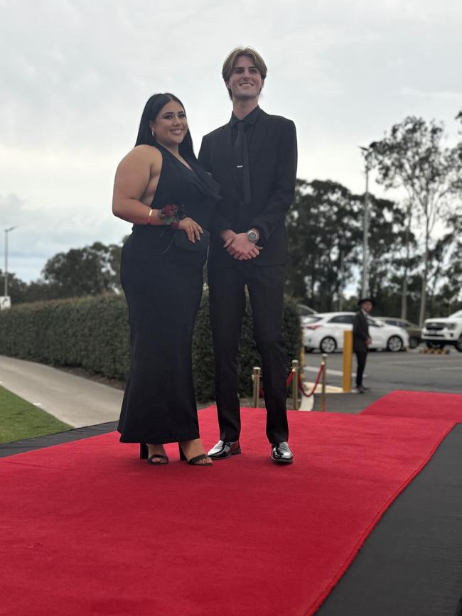 The students of Urangan State High School arriving at their formal.