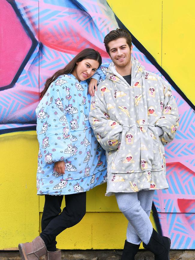 Finesse models Georgia Swayne, 22, and Kristos Jackson ,22, model various Oodie designs during the Covid-19 pandemic in 2020 when online sales were booming.Picture Mark Brake