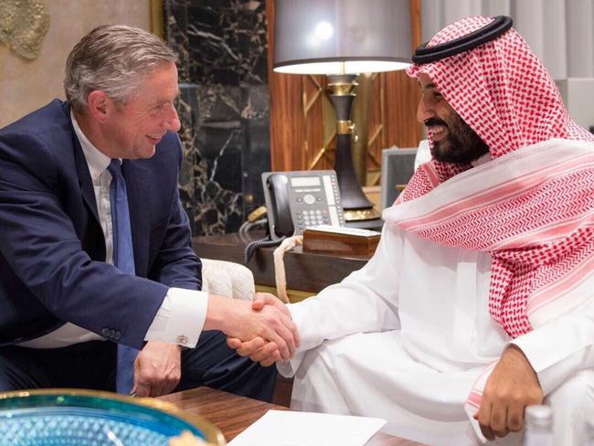 A handout picture provided by the Saudi Press Agency (SPA) on October 24, 2017 shows Saudi Crown Prince Mohammed bin Salman and Klaus Kleinfeld shaking hands following the Crown Prince's appointment of Kleinfeld as NEOM's Chief Executive Officer, in Riyadh. Saudi Arabia announced the launch of an independent economic zone on the Red Sea, dubbed NEOM three times the size of Cyprus and with a half a trillion dollars in projected investments. Kleinfeld, the former chairman of Alcoa and Arconic and a member of the Council on Foreign Relations, was appointed NEOM's first CEO. Kleinfeld has also served as advisor to the Chinese and Russian prime ministers.  / AFP PHOTO / SPA / HO