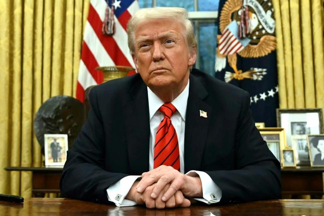 US President Donald Trump speaks to the press after signing an executive order in the Oval Office of the White House in Washington, DC, on February 10, 2025.