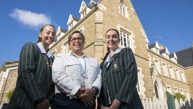 Back to school Year 12 students Isobel Gray and Sarah Wilson with their teacher Georgina Harris, Head of Staff Development at St Mary's College. Picture: Caroline Tan