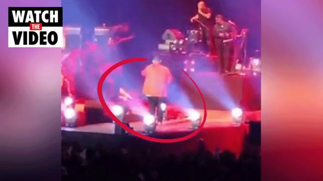 Singer dies after collapsing on stage mid-show | news.com.au ...