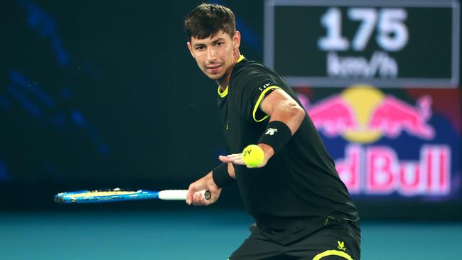 Alexei Popyrin of Australia plays a forehand against Fabian Marozsan of Hungary during their Red Bull Bassline match ahead of the 2025 Australian Open at Melbourne Park on January 07. Picture: Kelly Defina/Getty Images