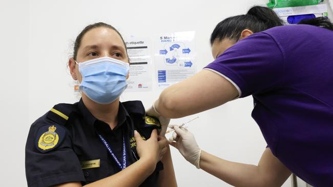 Australian Border Force worker Alysha Eyre receives a Covid-19 vaccination at Castle Hill Medical Centre last month.