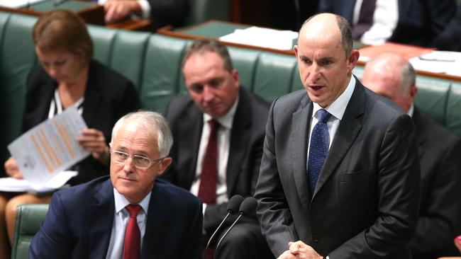 PM Malcolm Turnbull and Minister for Human Services and Veterans Affairs Stuart Robert in Question Time in the House of Representatives Chamber, Parliament House in Canberra.