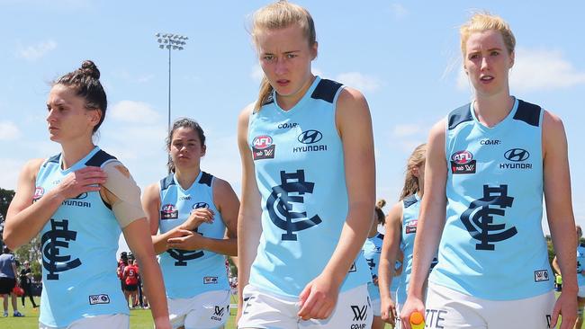 Carlton players leave the field after the loss. Picture: Getty