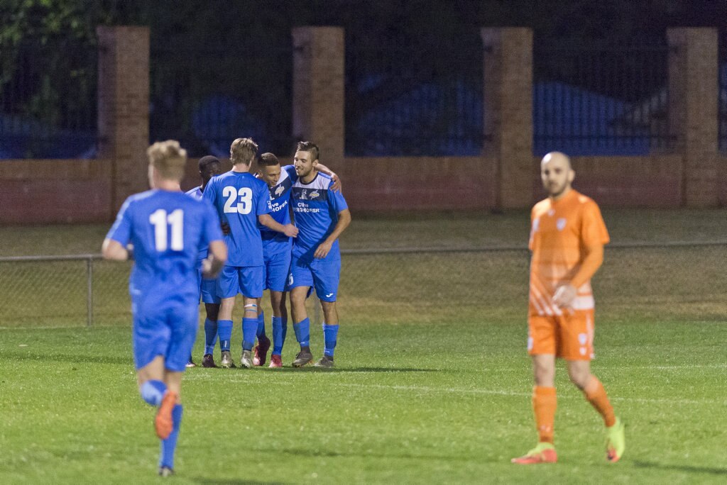 South West Queensland Thunder celebrate a Travis Cooper goal against Cairns FC in NPL Queensland men round 26 football at Clive Berghofer Stadium, Saturday, August 25, 2018. Picture: Kevin Farmer