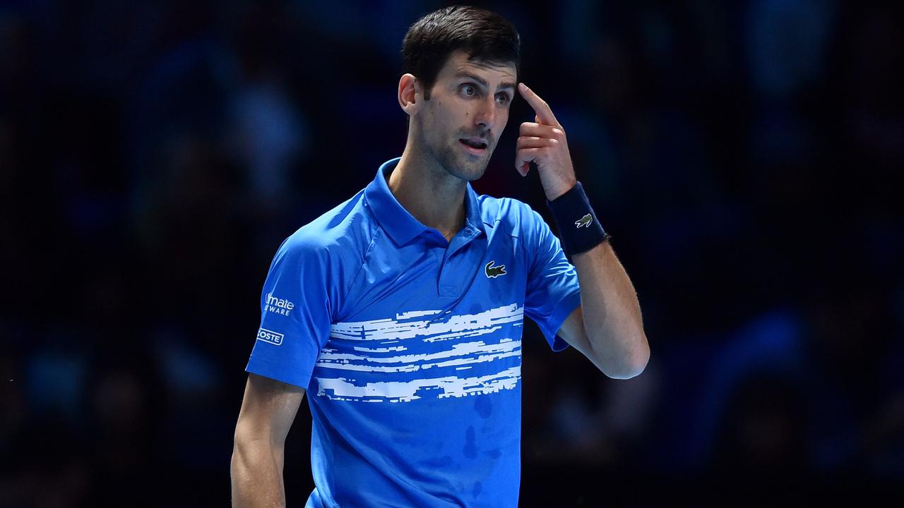 Novak Djokovic during his most recent match against Dominic Thiem - a loss, on a hard court, at the 2019 ATP Finals in London. (Photo by Glyn KIRK / AFP)