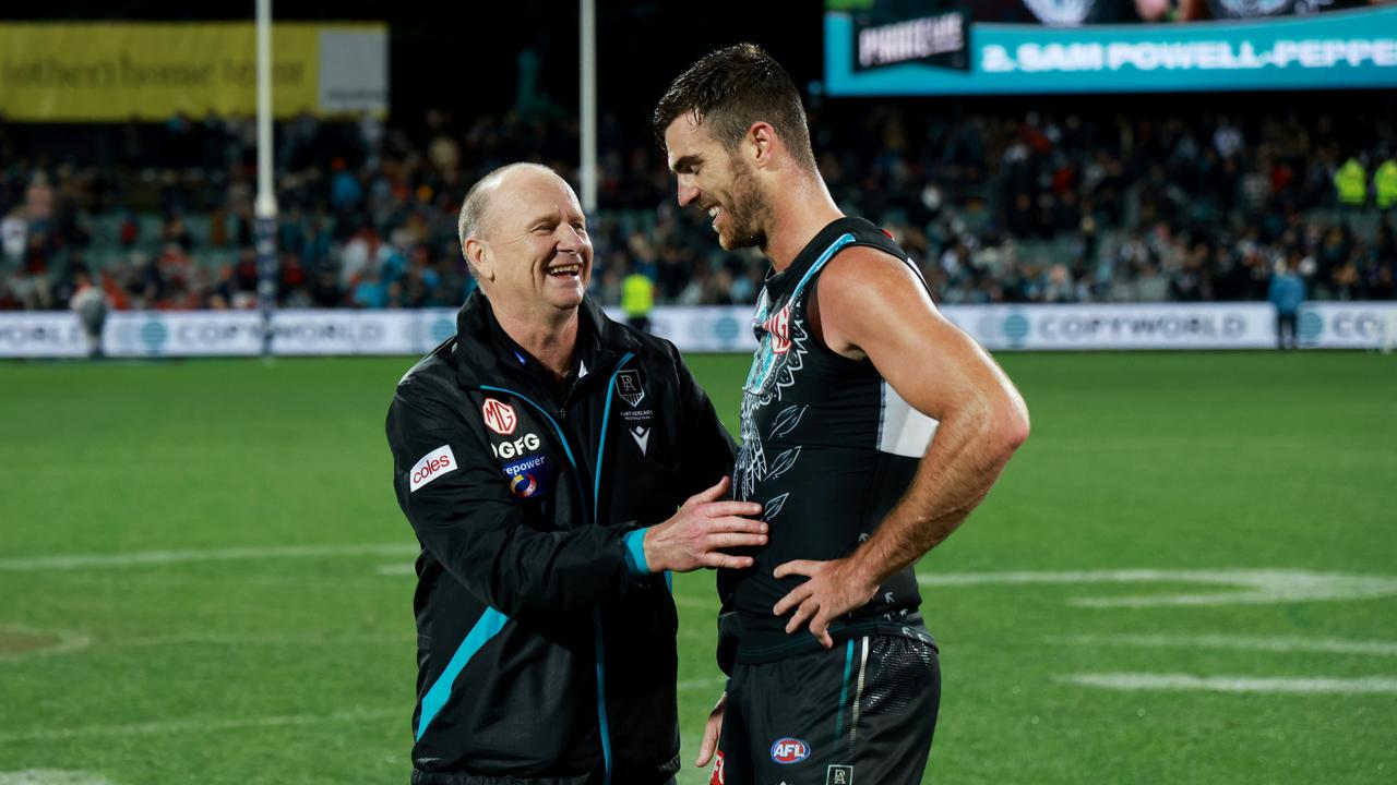 Ken Hinkley and returning big man Scott Lycett after the win. Picture: James Elsby/AFL Photos