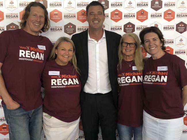 Northern Beaches mayor Michael Regan with some of his "Reganeer" campaign volunteers at his NSW election campaign launch at Manly Warringah Football Club at Cromer on Thursday. Picture: Jim O'Rourke